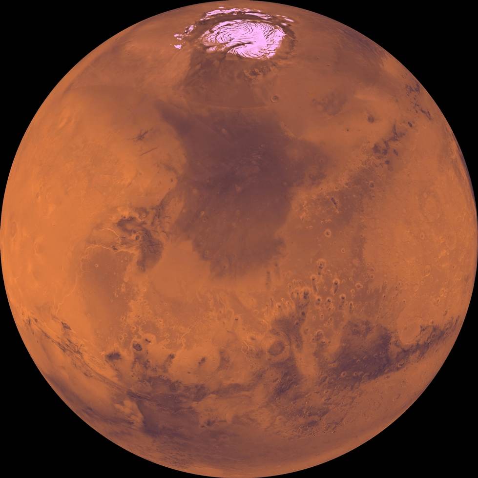 This full-disk image of Mars from Viking 1 Orbiter showcases the north polar cap. June 8, 1976 | NASA/JPL/USGS